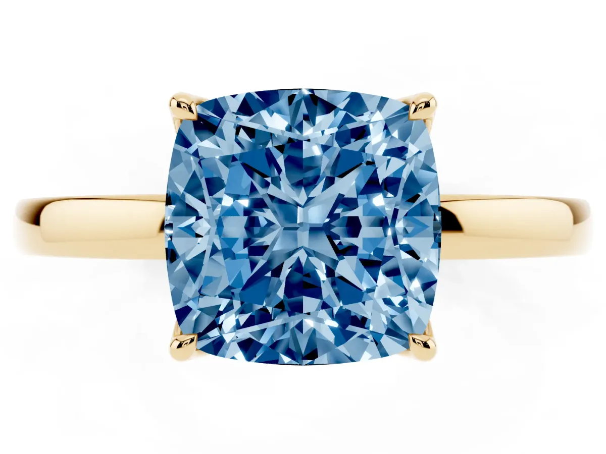 Fancy Blue Cushion Cut Diamond Solitaire Ring with Thin Band and Prong Setting Yellow gold