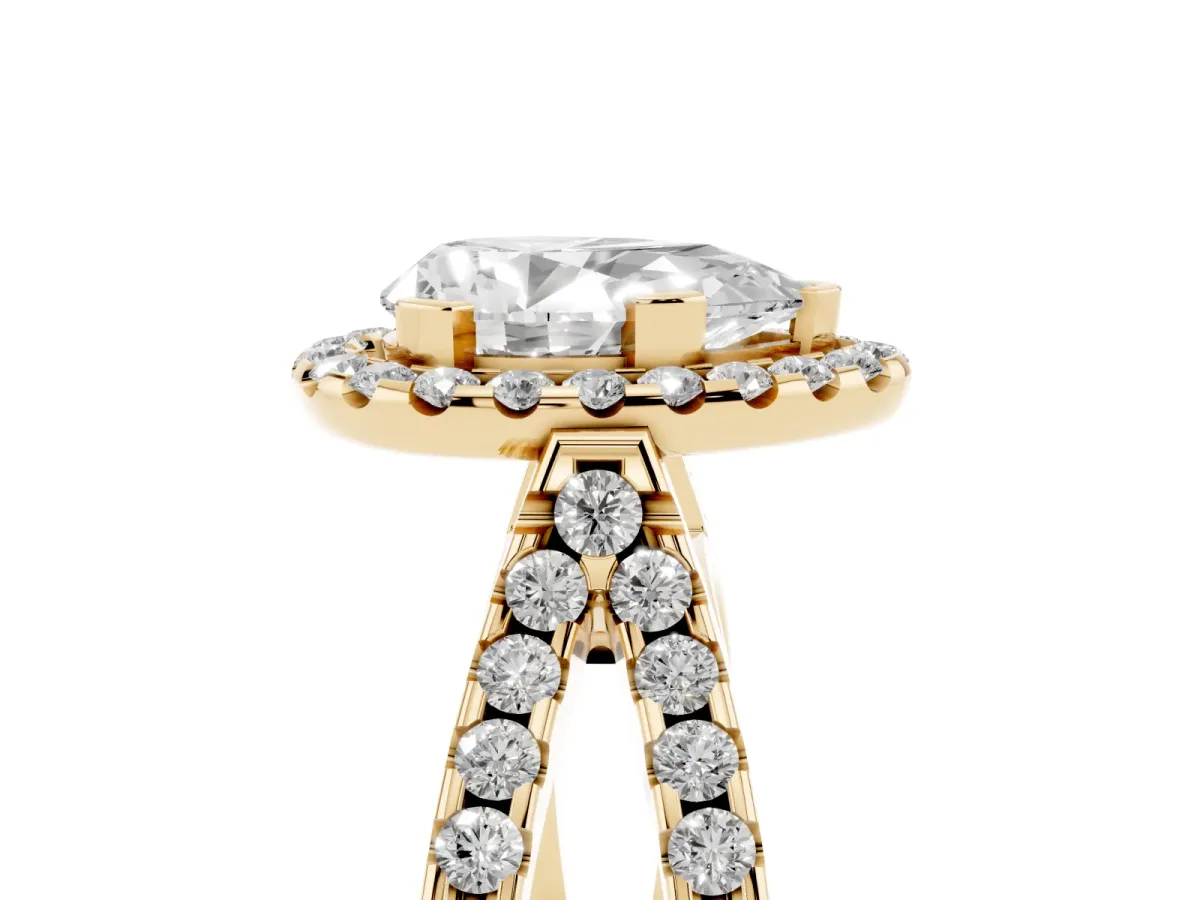 Pear Cut Diamond Halo Ring with Split Shank Pavé Band and Prong Setting Yellow gold