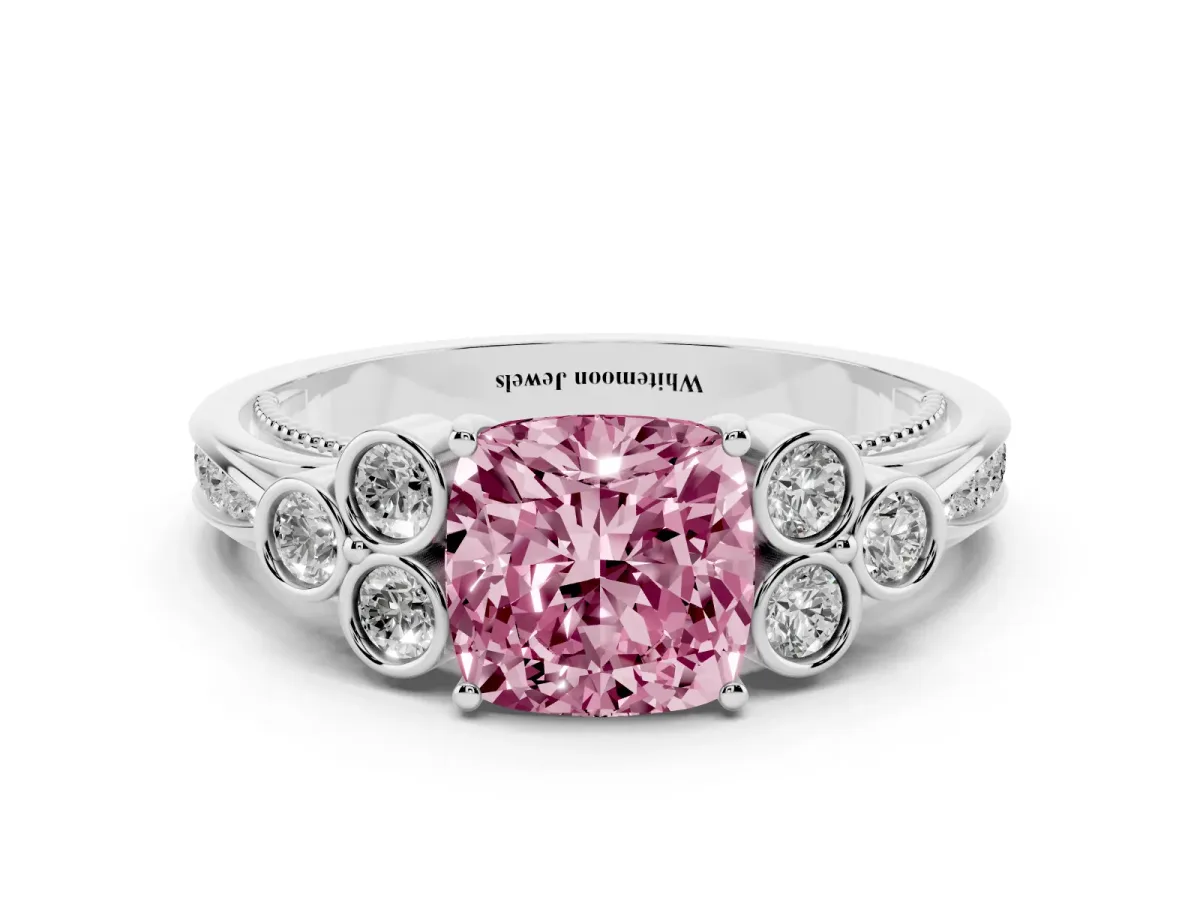 Fancy Pink Cushion Cut Cut Diamond Engagement Ring with Bezel Set Round Side Stones and Prong Setting Platinum