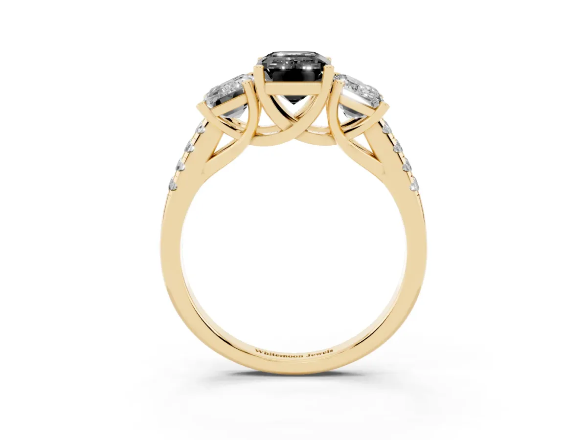 Fancy Black Three-Stone Emerald Cut Diamond Ring with Round Pavé Band and Prong Setting Yellow gold