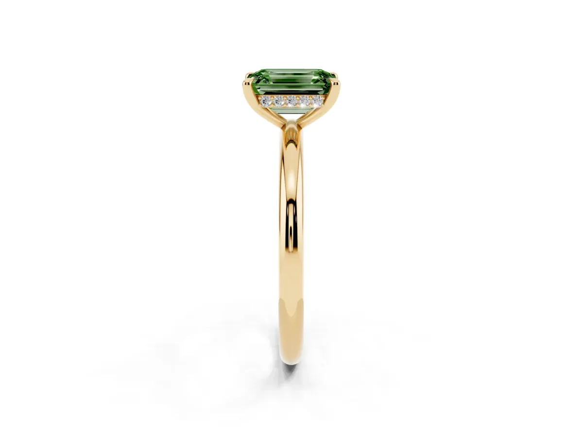 Fancy Green Emerald Cut Diamond Solitaire Ring with Thin Band and Four-Prong Setting Yellow gold