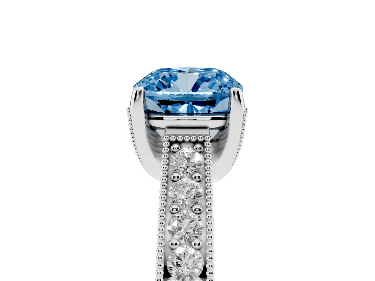 Fancy Blue Cushion Cut Cut Diamond Solitaire Ring with Milgrain Pave Band and Four Prong Setting Silver