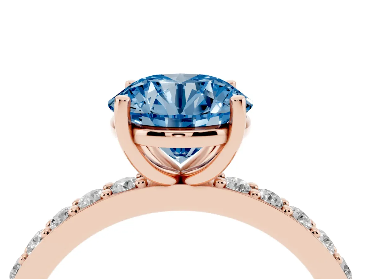 Fancy Blue Round Cut Cut Diamond Solitaire with Pave Band and Four-Prong Setting Rose gold
