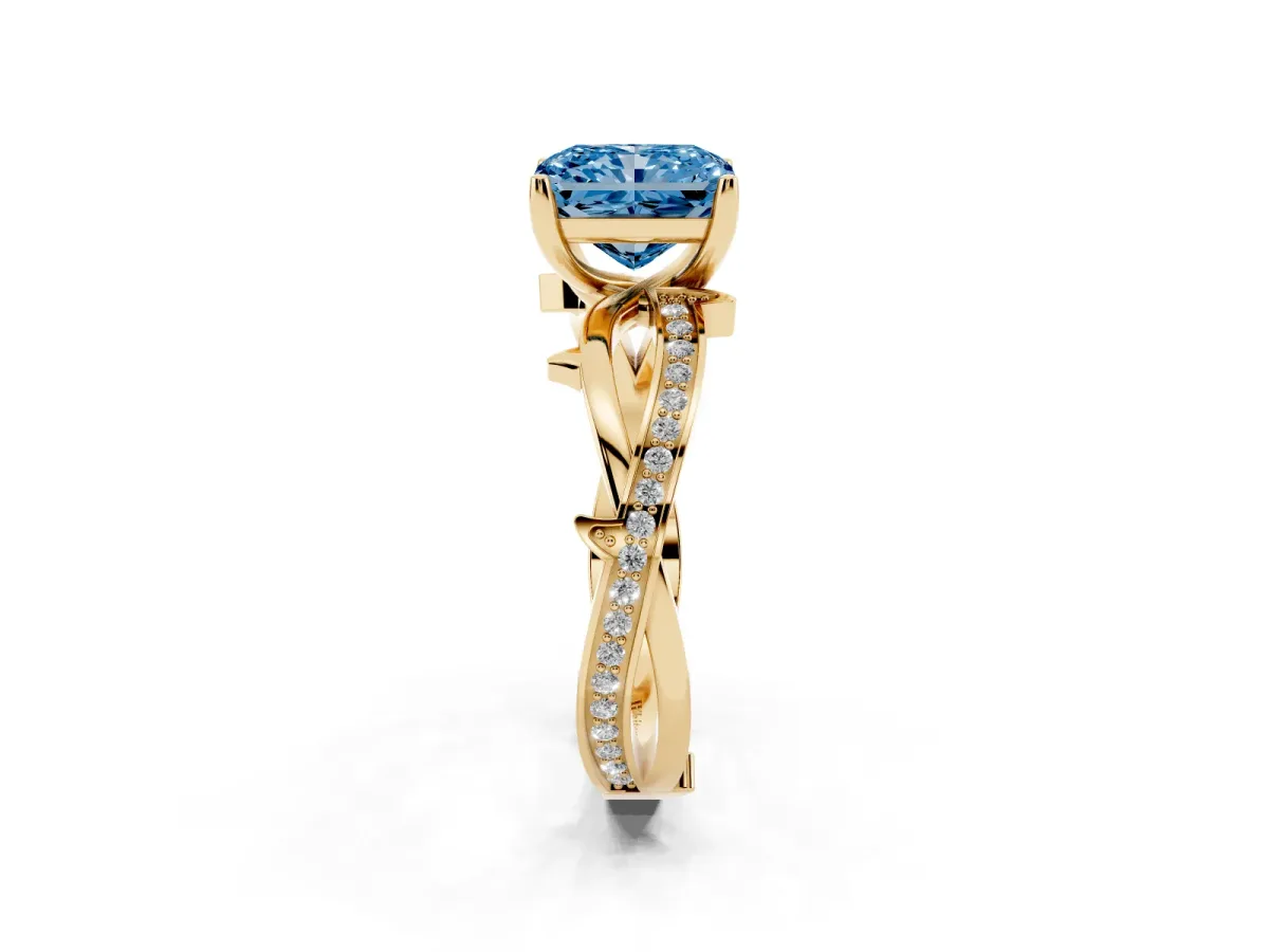 Fancy Blue Radiant Cut Solitaire Twist Band with Pavé Accents and Four-Prong Setting Yellow gold
