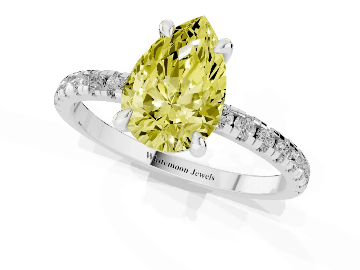 Fancy Yellow Pear Cut Diamond Brilliant Solitaire Ring with Pavé Band and Four-Prong Setting Silver