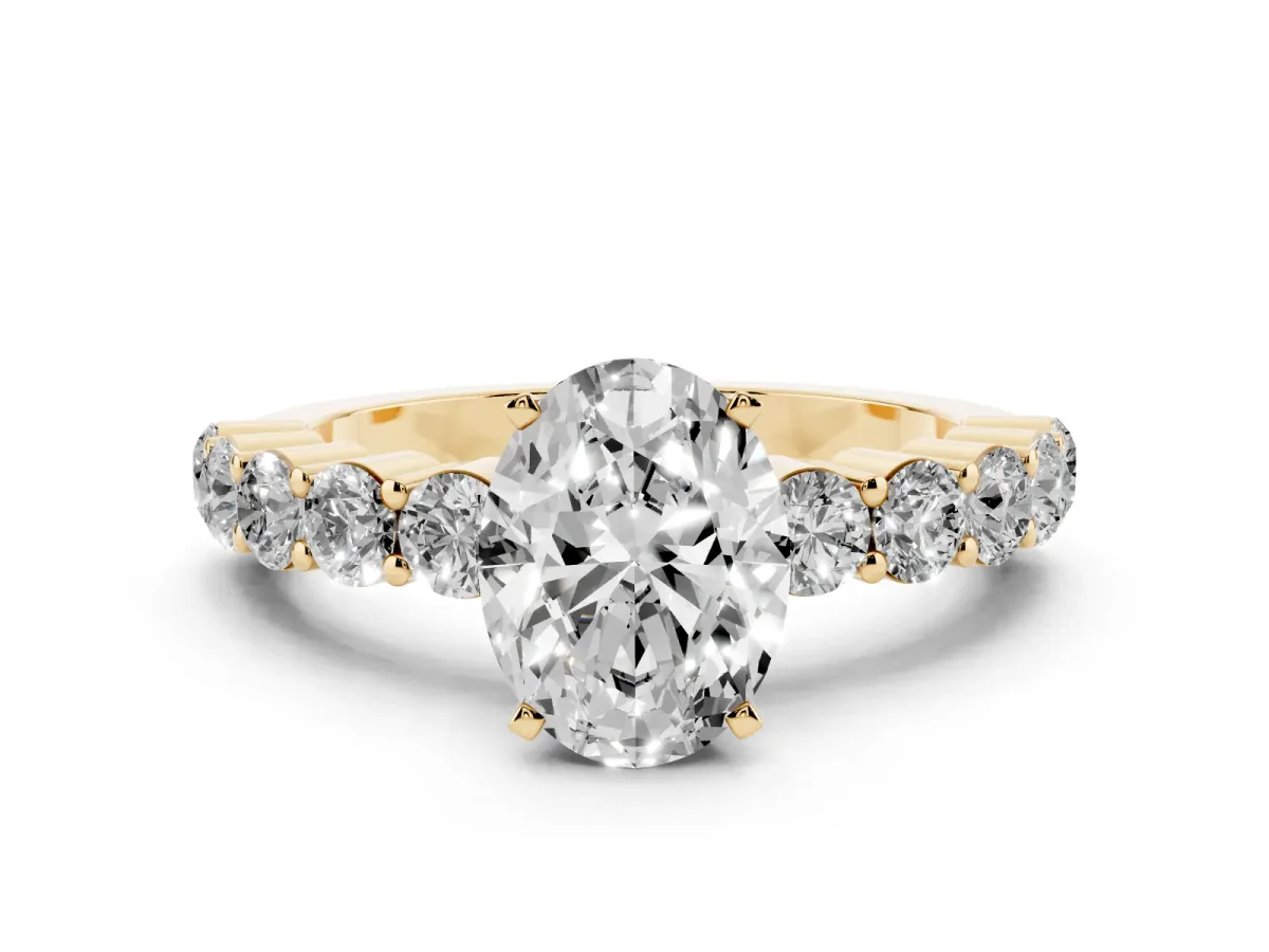 Oval Cut Diamond Solitaire Ring with Shared Prong Round Side Stones Yellow gold