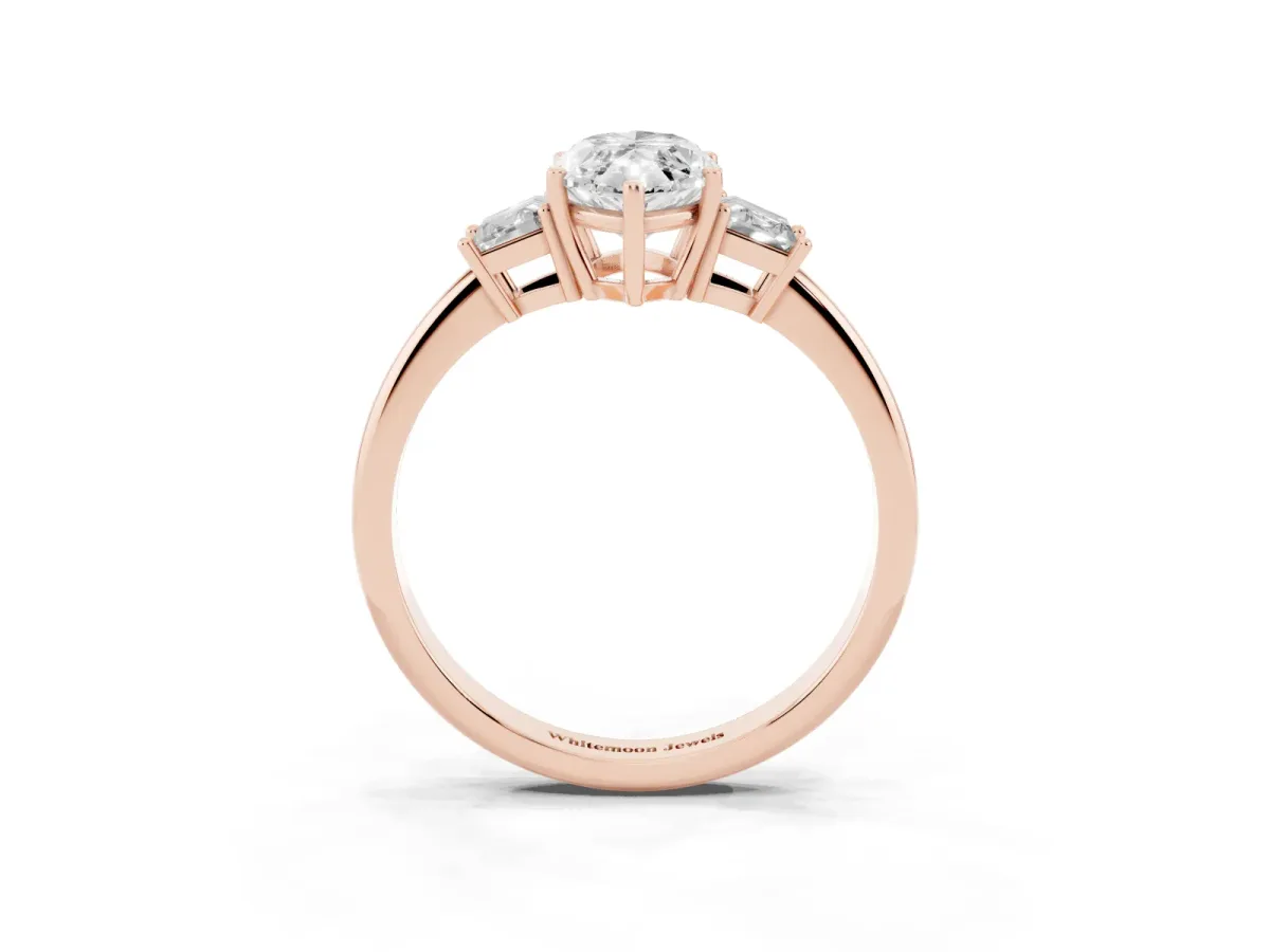 Marquise Cut Diamond Three-Stone Ring with Trapezoid Side Stones and Prong Setting Rose gold