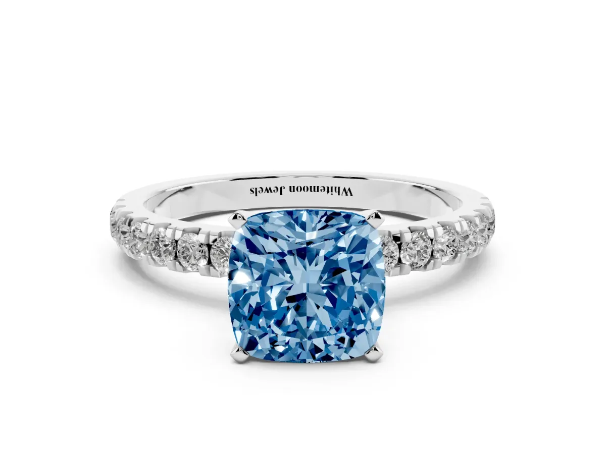Fancy Blue Cushion Cut Diamond Solitaire Ring with Pavé Accents and Four-Prong Setting Silver