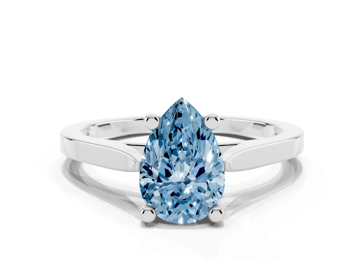 Fancy Blue Pear Cut Solitaire Diamond Ring with Four-Prong Setting and Tapered Band Platinum