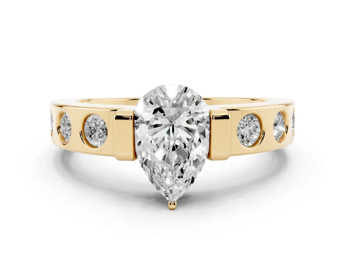 Pear Cut Brilliant Channel-Set Diamond Ring with Bezel Prong Setting Yellow gold