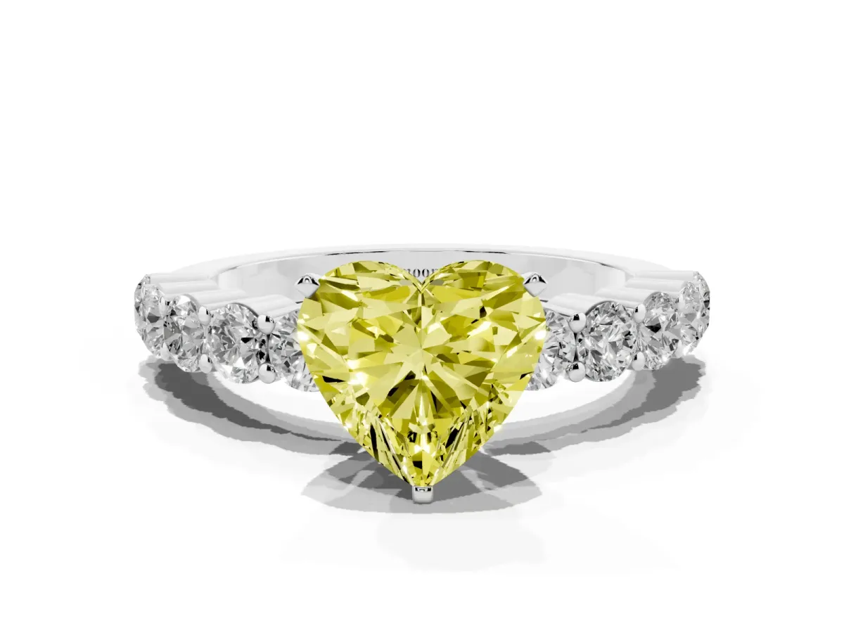 Fancy Yellow Heart Cut Diamond Solitaire Ring with Shared Prong Round Side Stones Silver