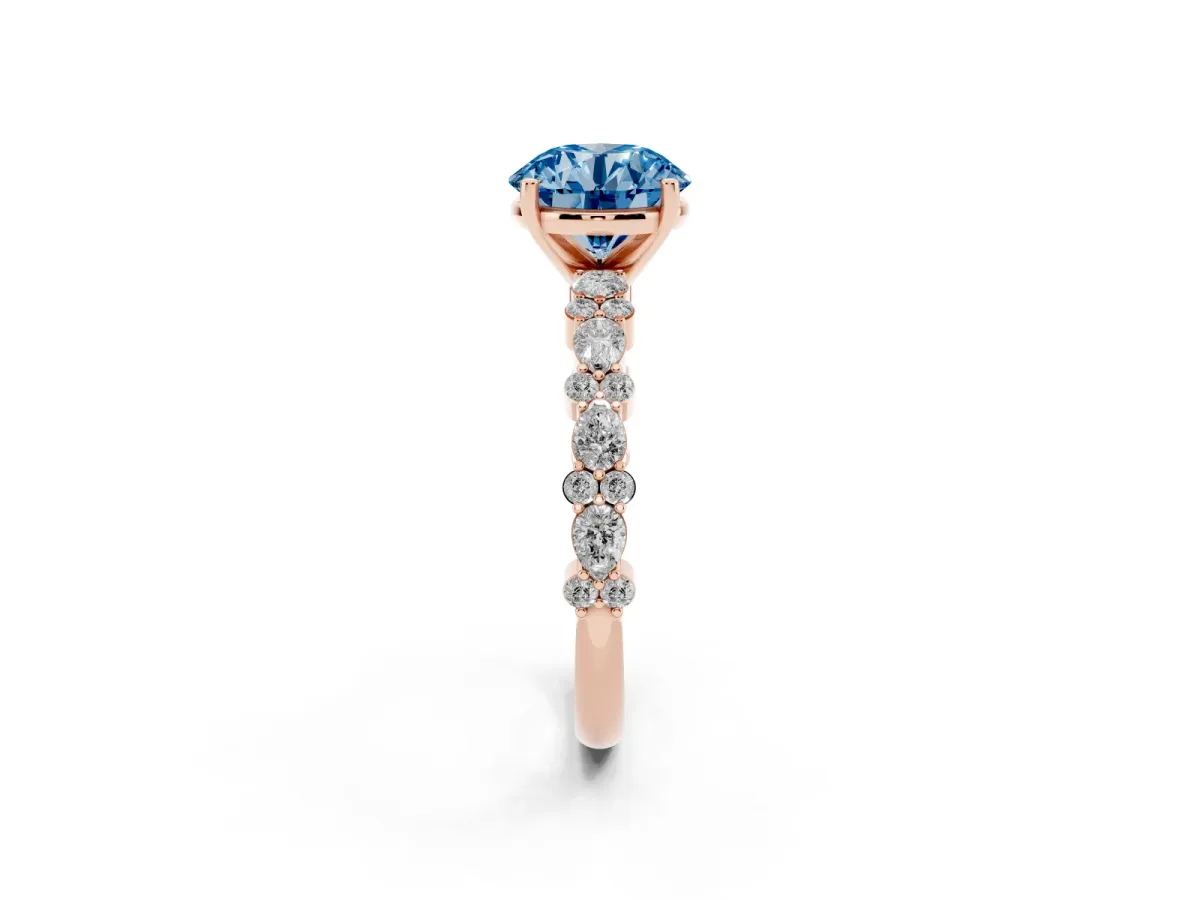 Fancy Blue Round Cut Diamond Side Stone Solitaire Ring with Round and Four-Prong Setting Rose gold