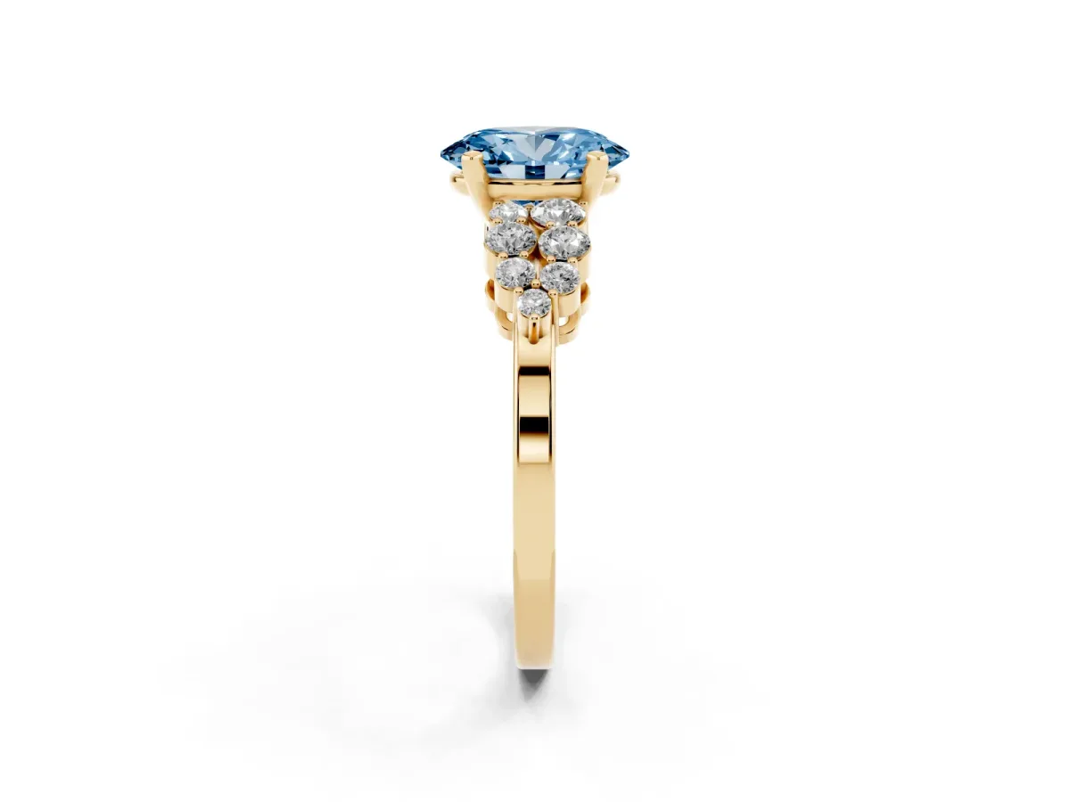 Fancy Blue Oval Cut Cluster Diamond Engagement Ring with Pavé Band and Four-Prong Setting Yellow gold