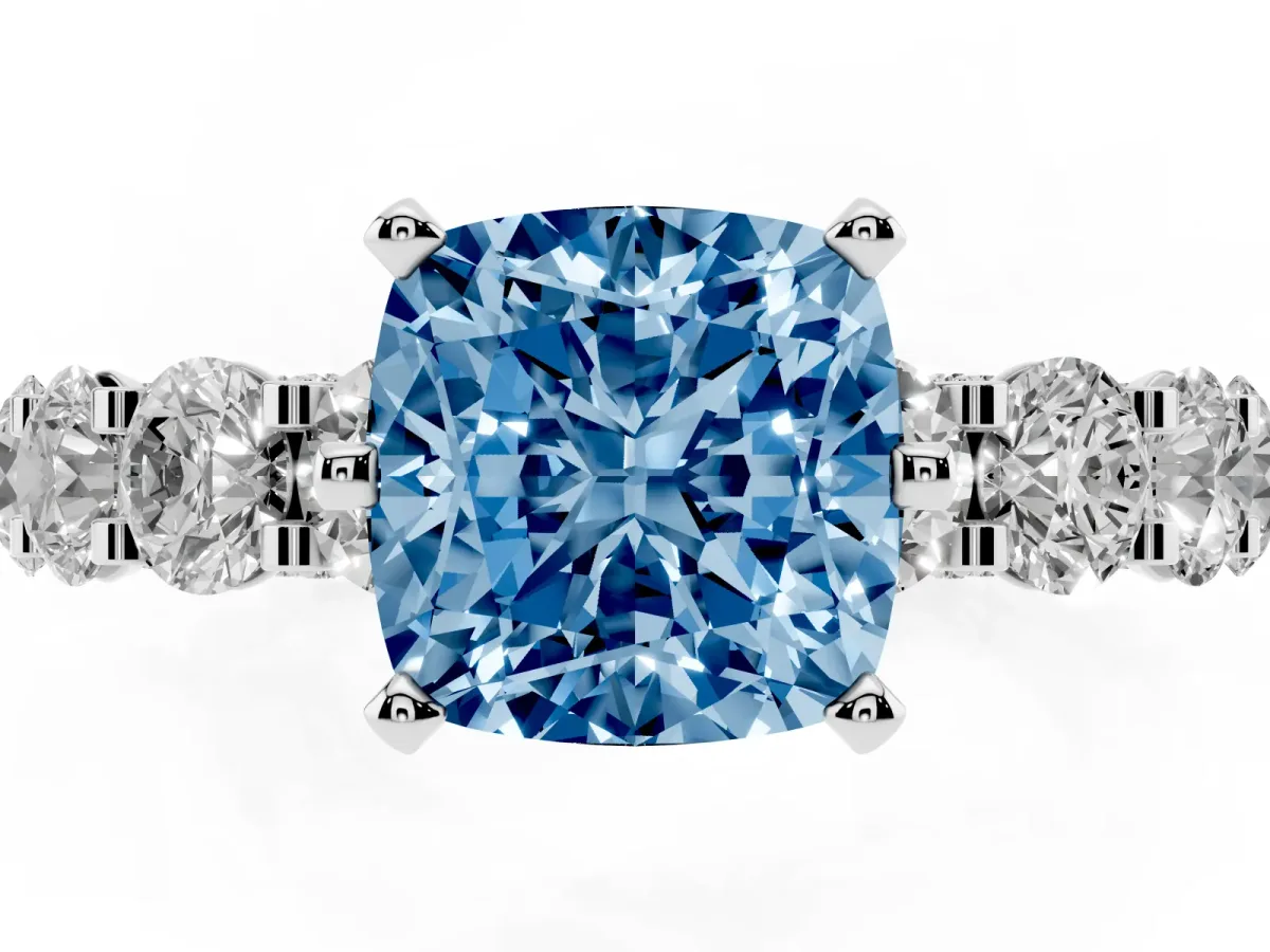 Fancy Blue Cushion Cut Diamond Side Stone Engagement Ring with Four-Prong Setting Platinum