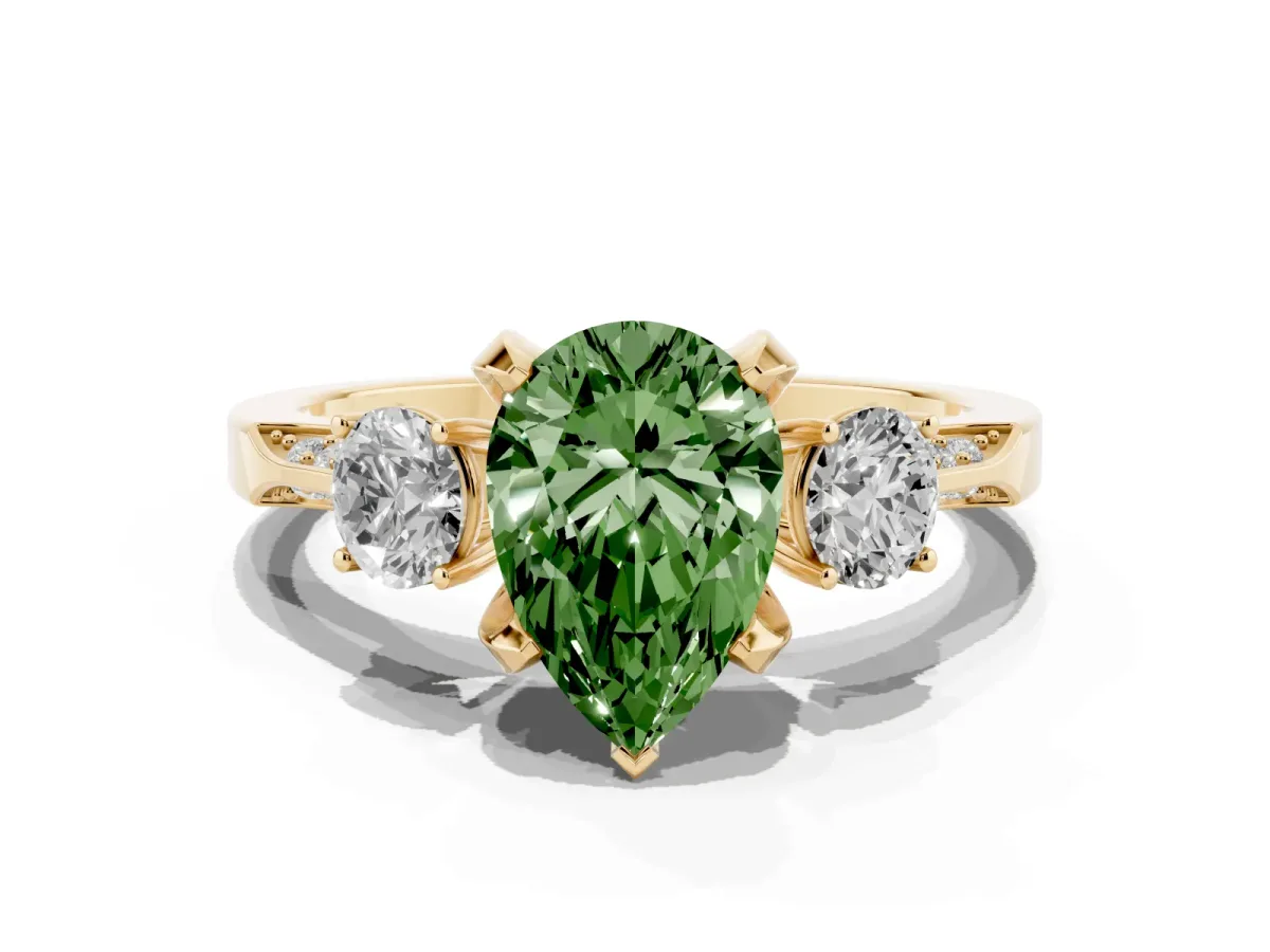 Fancy Green Pear Cut Brilliant Three-Stone Diamond Ring with Pavé Band and Four-Prong Setting Yellow gold