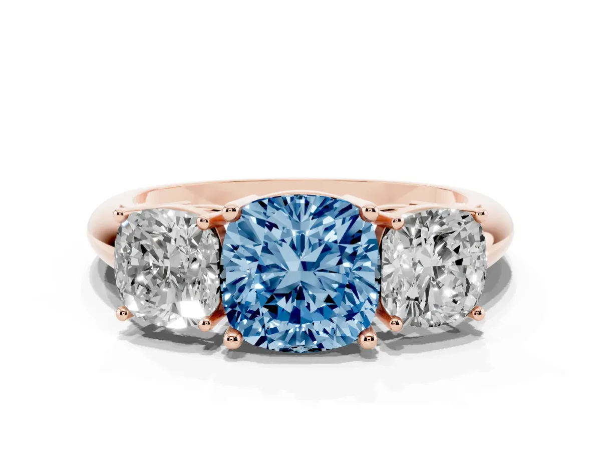 Fancy Blue Three-Stone Cushion Cut Cut Diamond Engagement Ring with Prong Setting on a White Gold Band Rose gold