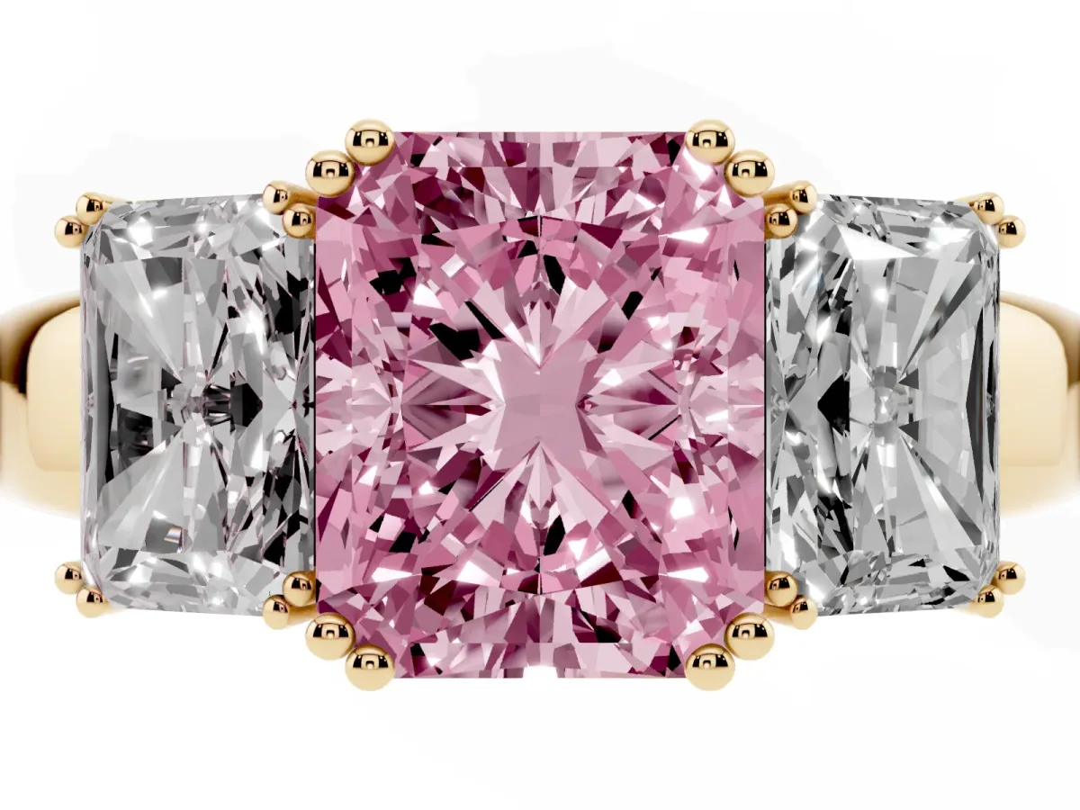 Fancy Pink Three-Stone Radiant Cut Cut Diamond Ring with Channel Set Band and Four-Prong Setting Yellow gold