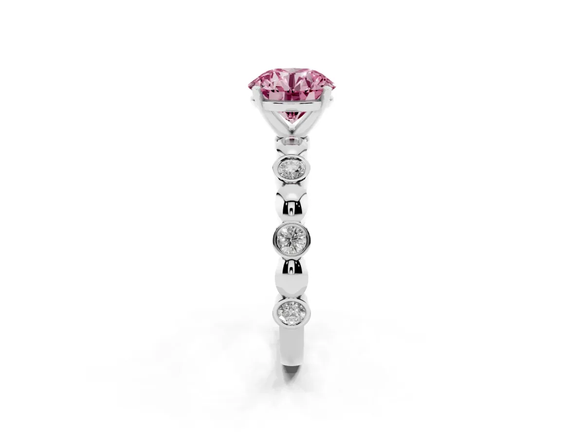 Fancy Pink Round Cut Solitaire Bezel-Set Diamond Ring with Beaded Band and Four-Prong Setting Silver