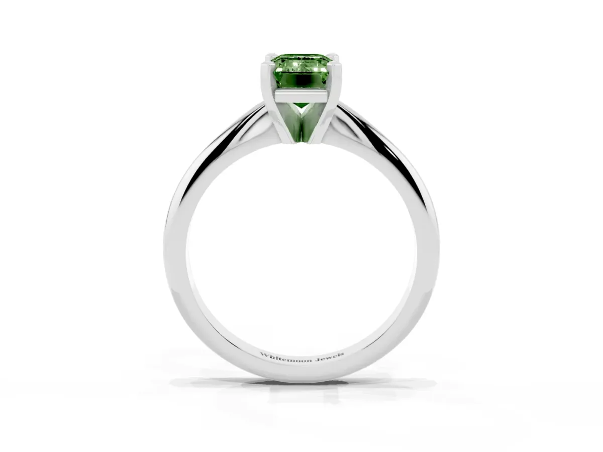 Fancy Green Emerald Cut Cut Solitaire Ring with Four-Prong Setting on a Classic Band Platinum