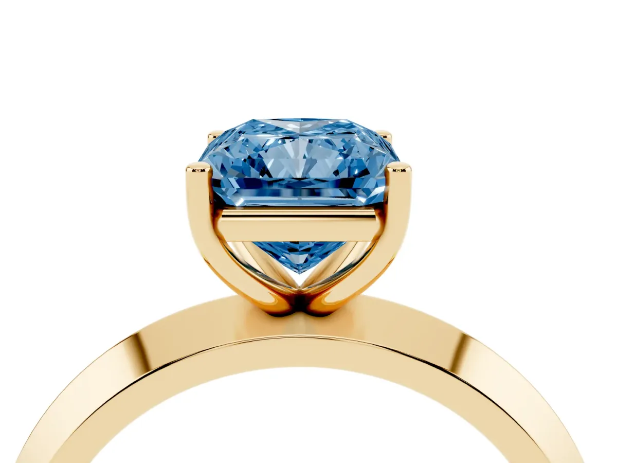 Fancy Blue Radiant Cut Cut Solitaire Engagement Ring with Flat Band and Four-Prong Setting Yellow gold