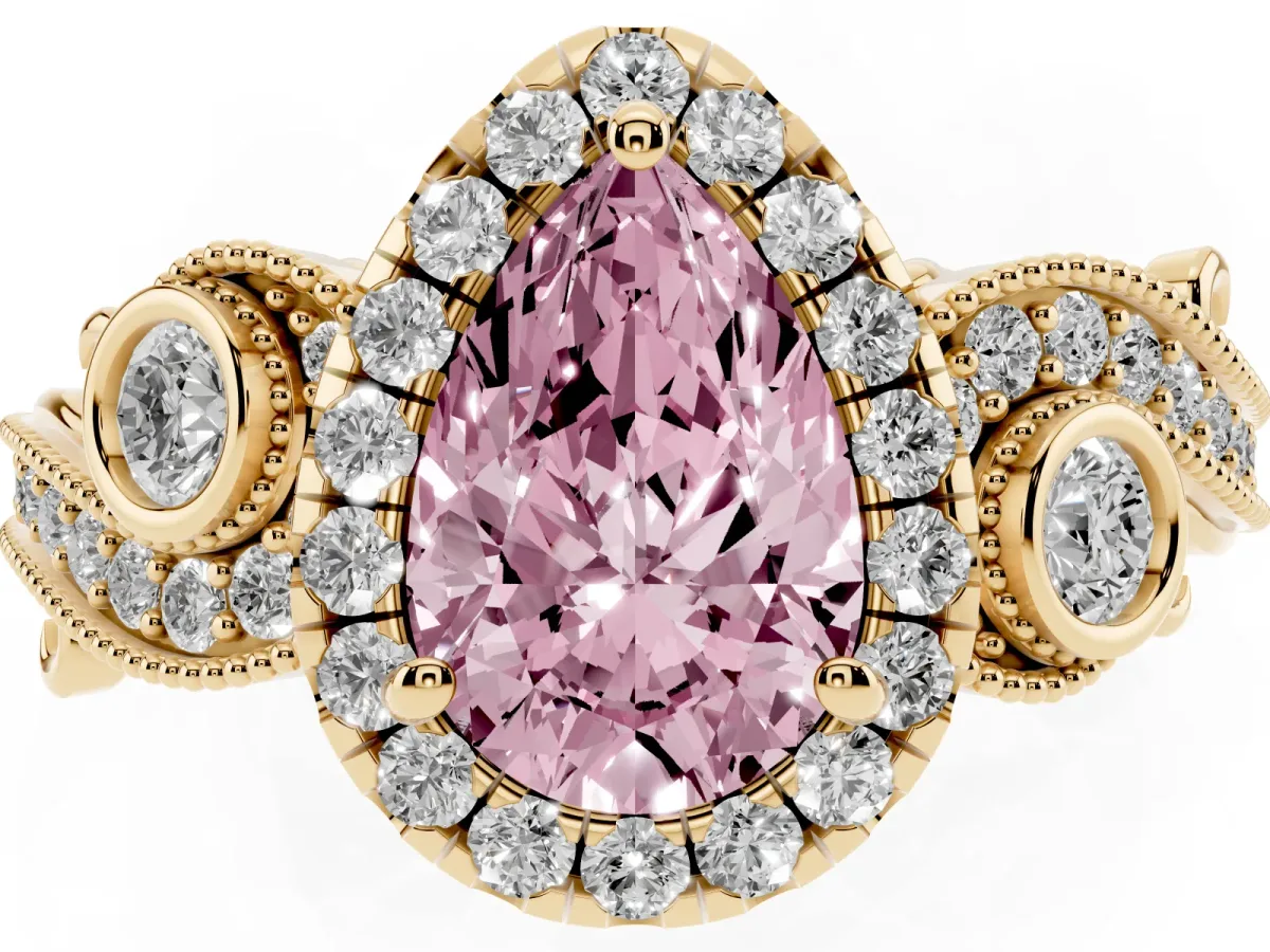 Fancy Pink Pear Cut Halo Diamond Ring with Milgrain and Bezel Accents on a Split Shank Band Yellow gold