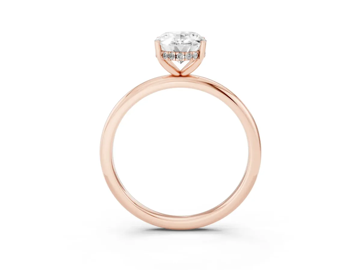 Oval Cut Cut Solitaire Engagement Ring with Four-Prong Setting and Classic Band Rose gold