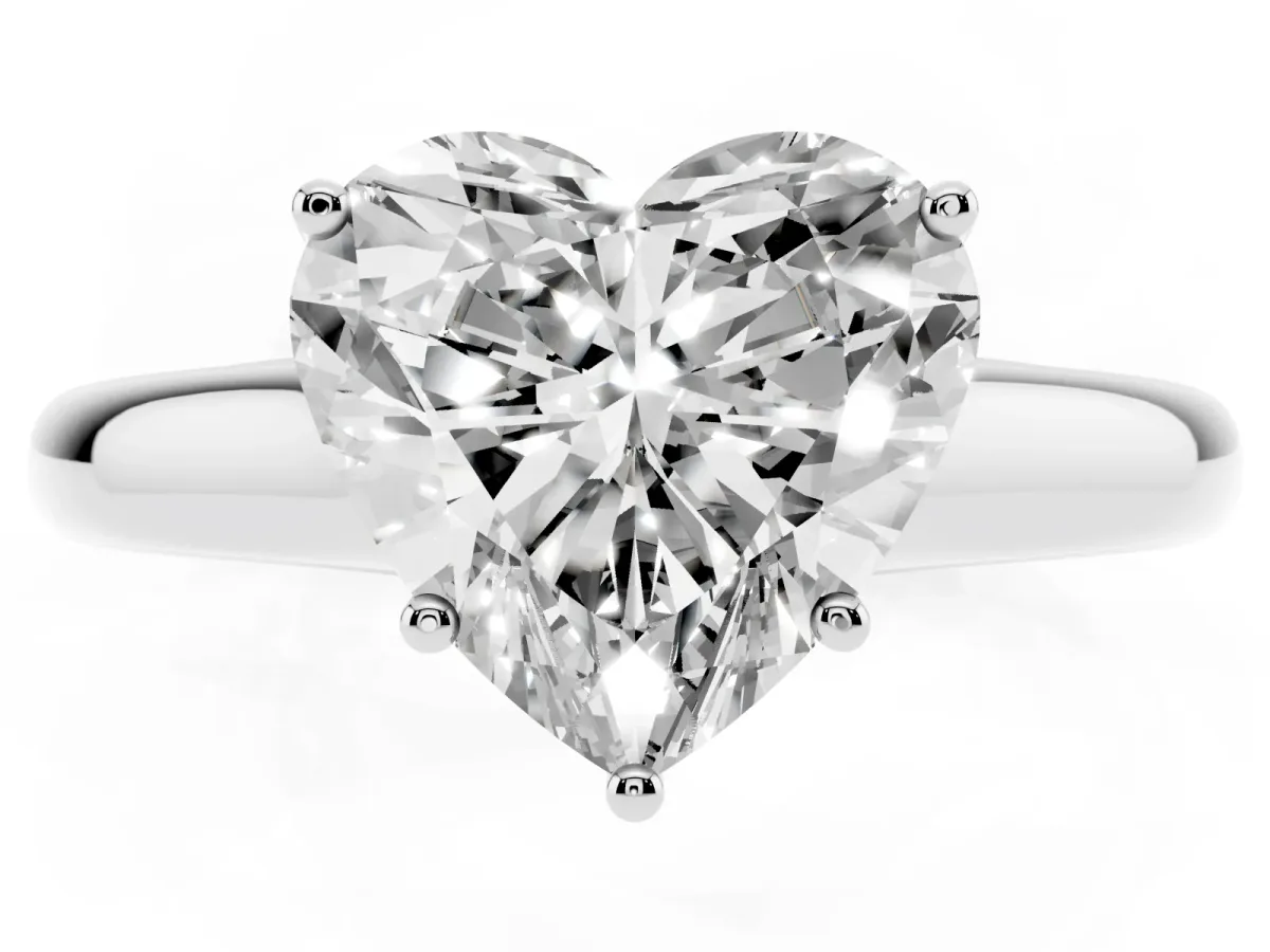 Heart Cut Cut Diamond Solitaire Engagement Ring with Tapered Plain Band and Four-Prong Setting Platinum