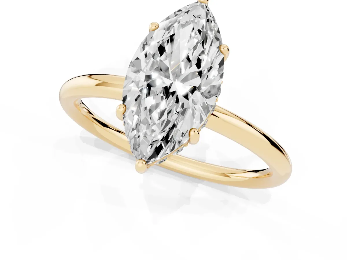 Marquise Cut Solitaire Diamond Ring with a Classic Band and Four-Prong Setting Yellow gold