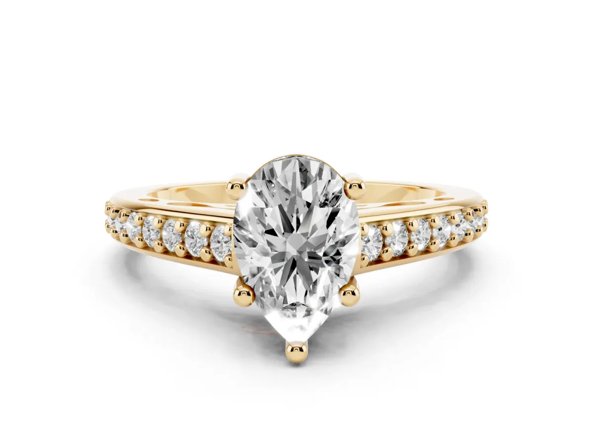 Pear Cut Solitaire Prong Set Diamond Engagement Ring with Pave Band Yellow gold