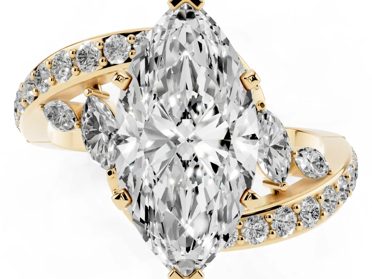 Marquise Cut Solitaire with Pavé Twist Band and Four-Prong Setting Yellow gold