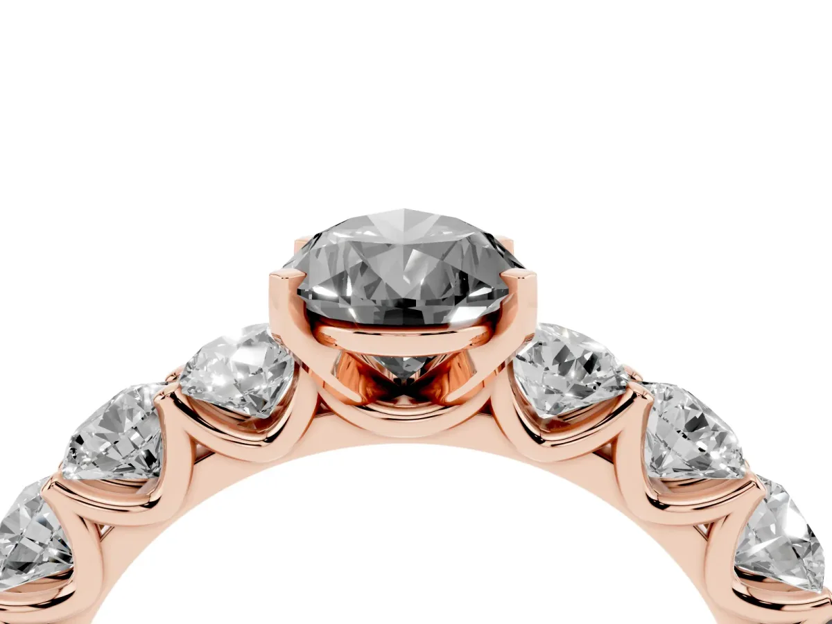 Fancy Black Pear Cut Diamond Prong Setting with Side Stones on a Pave Band Rose gold