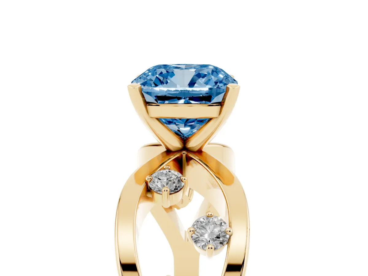 Fancy Blue Cushion Cut Cut Solitaire Diamond with Side Stones on Criss-Cross Band and Four-Prong Setting Yellow gold