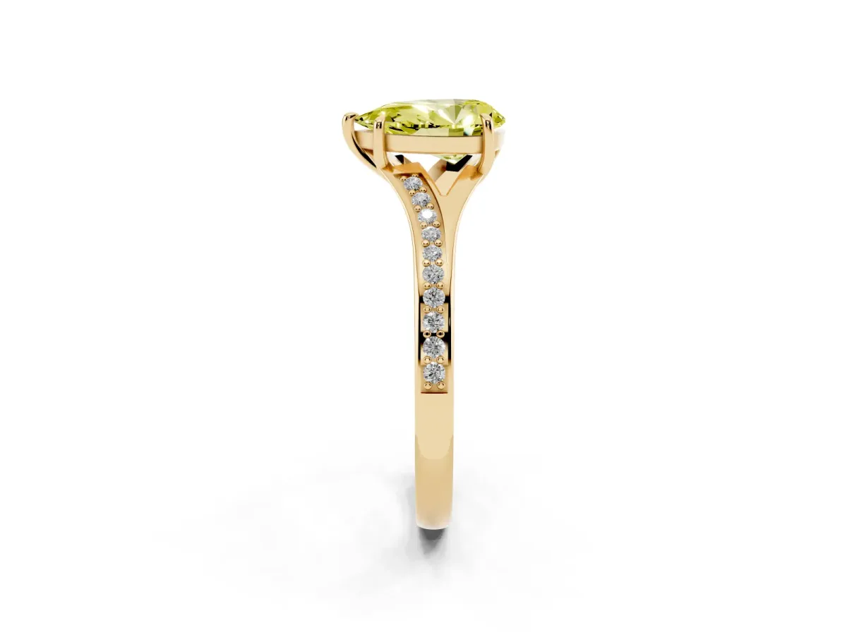 Fancy Yellow Pear Cut Diamond Solitaire Ring with Pavé Band and Prong Setting Yellow gold