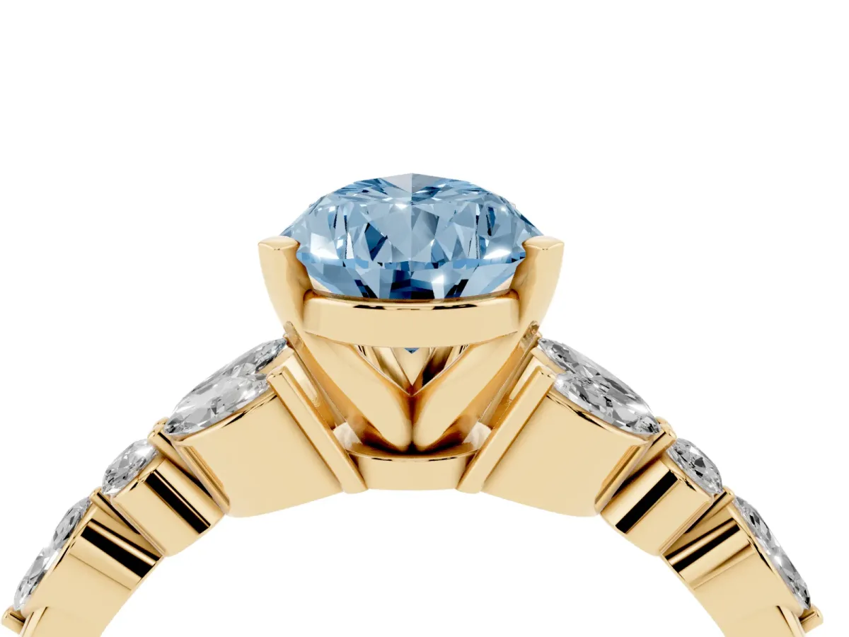 Fancy Blue Pear Cut Diamond Solitaire Ring with Side Stones and Four-Prong Setting Yellow gold