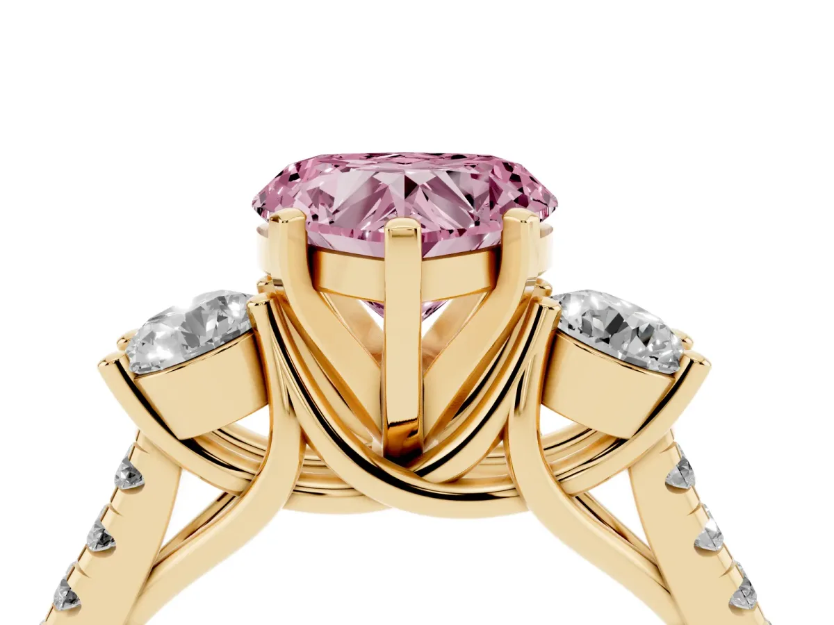 Fancy Pink Three-Stone Heart Cut Diamond Pavé Band with Four-Prong Setting Yellow gold
