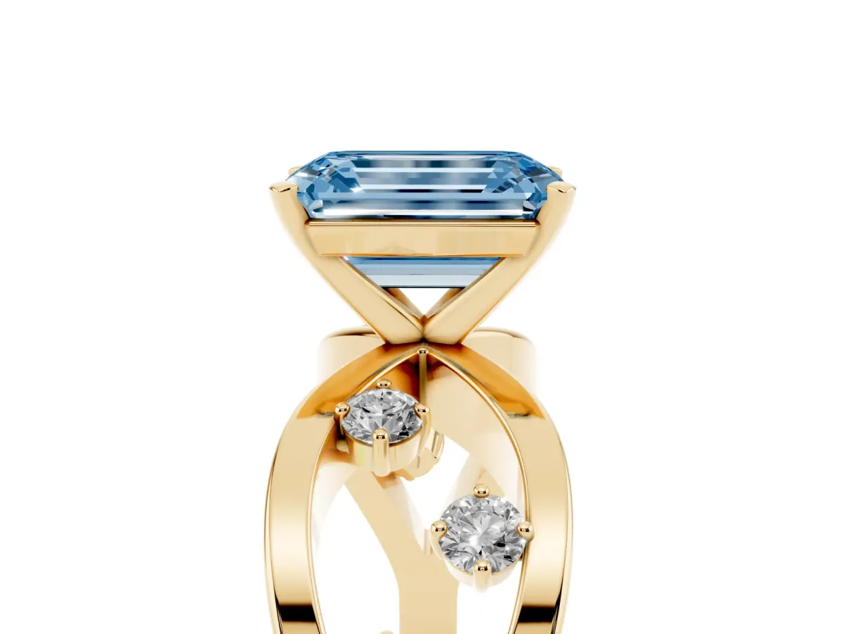 Fancy Blue Emerald Cut Cut Solitaire Diamond with Side Stones on Criss-Cross Band and Four-Prong Setting Yellow gold