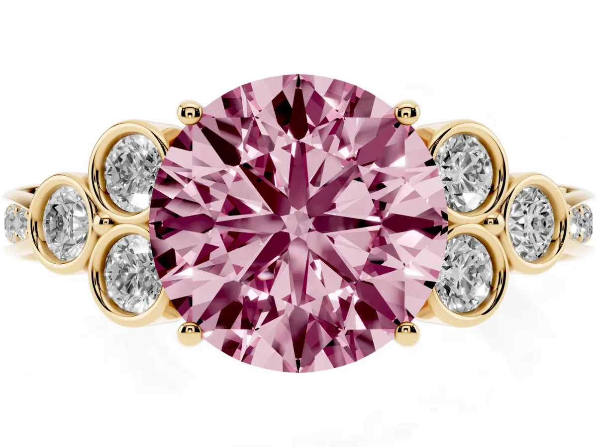 Fancy Pink Round Cut Cut Diamond Engagement Ring with Bezel Set Round Side Stones and Prong Setting Yellow gold