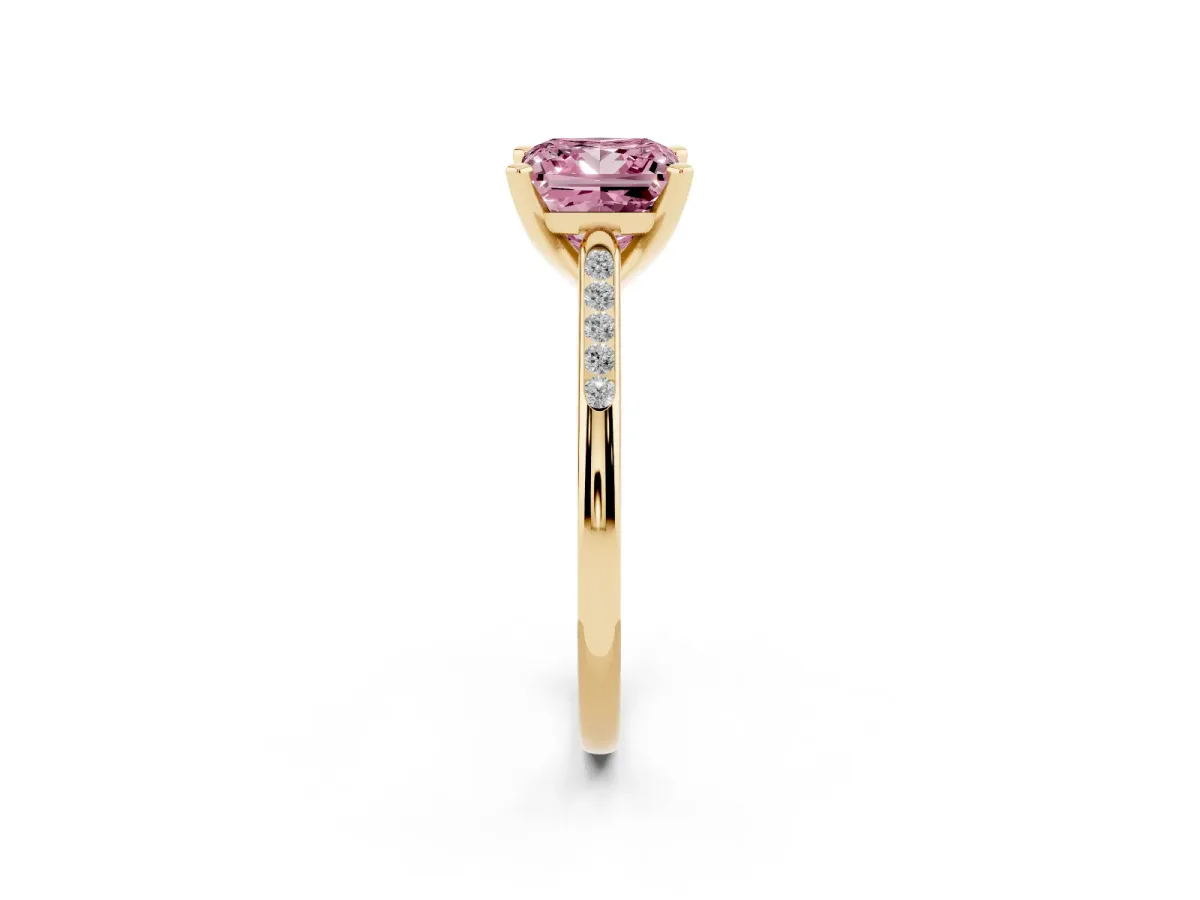 Fancy Pink Princess Cut Diamond Solitaire Ring with Channel Set Round Band and Prong Setting Yellow gold