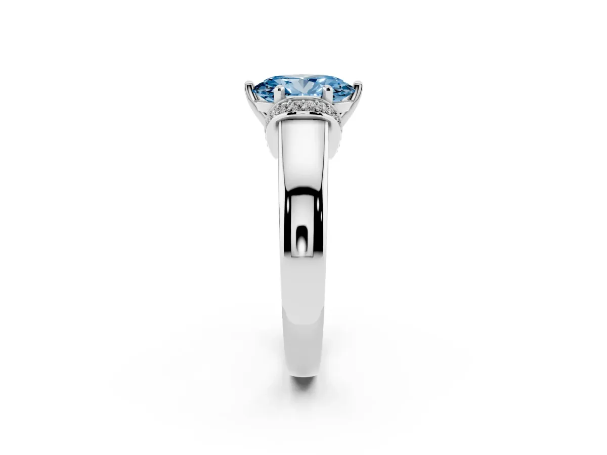 Fancy Blue Oval Cut Solitaire Diamond Ring with Pave Band and Six-Prong Setting Silver