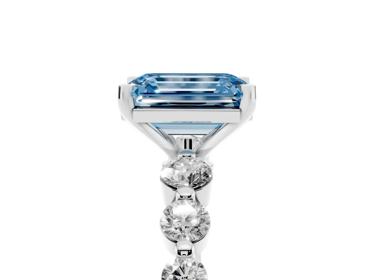 Fancy Blue Emerald Cut Solitaire Diamond Ring with Pave Band and Four-Prong Setting Silver