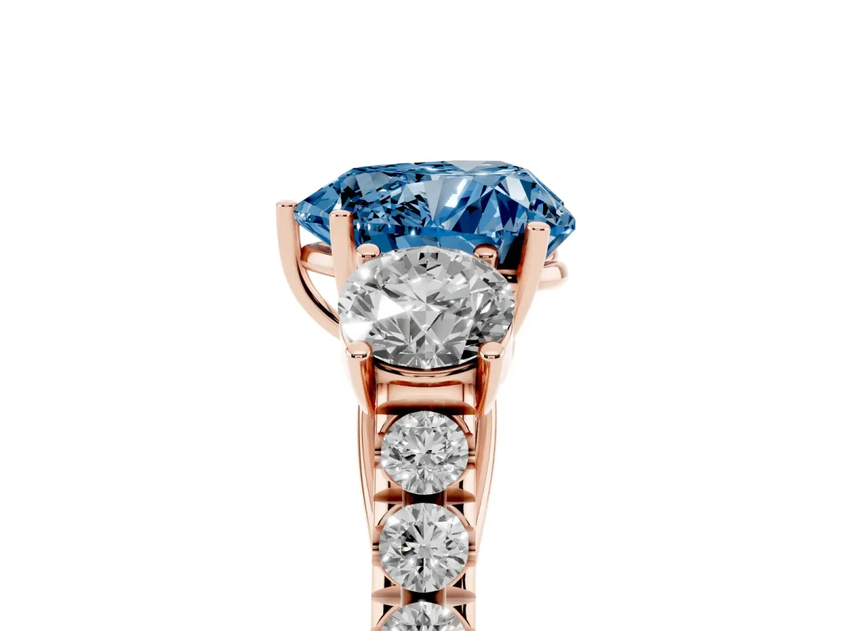 Fancy Blue Heart Cut Cut Diamond Three-Stone Ring with Round Side Stones and Pavé Band Rose gold