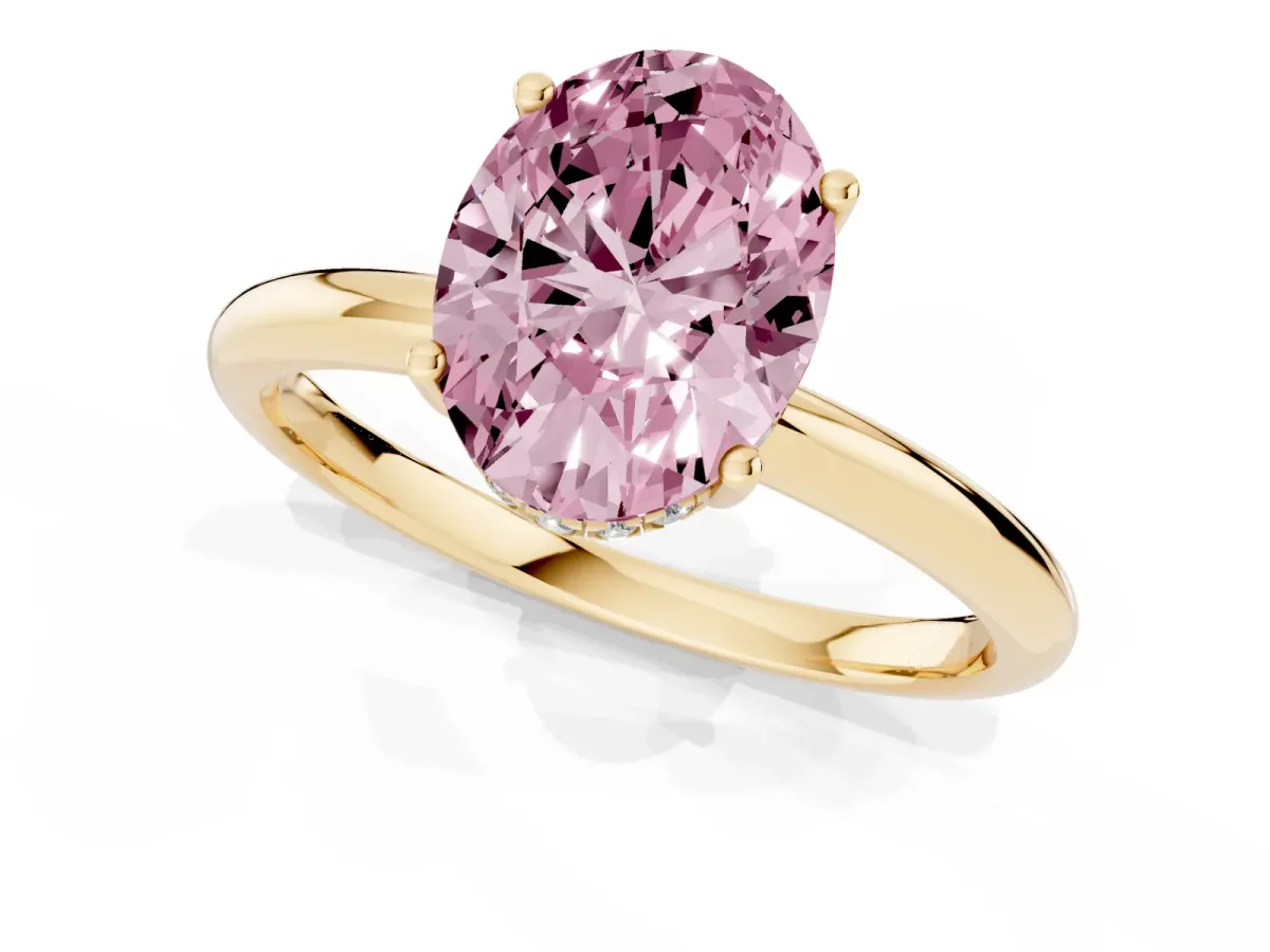 Fancy Pink Oval Cut Cut Solitaire Engagement Ring with Four-Prong Setting and Classic Band Yellow gold