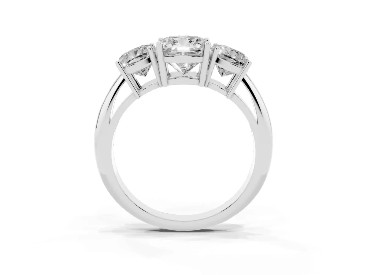 Three-Stone Cushion Cut Cut Diamond Engagement Ring with Prong Setting on a White Gold Band White gold