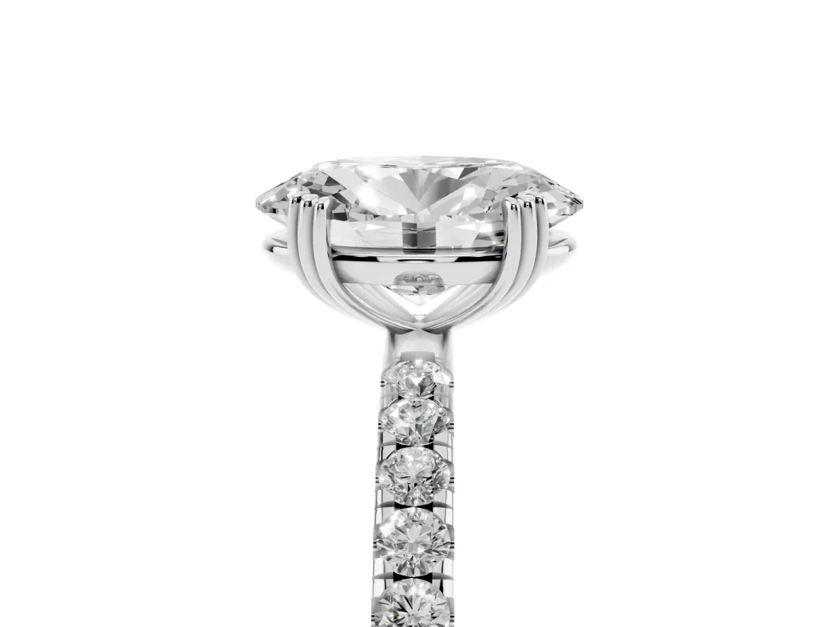 Oval Cut Brilliant Solitaire with Pavé Band and Claw Prong Setting Silver
