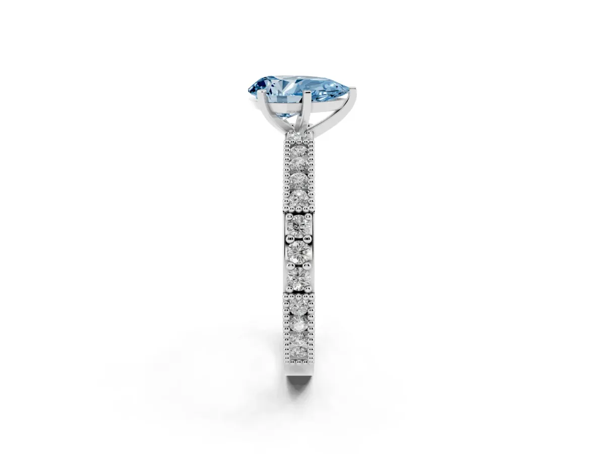 Fancy Blue Pear Cut Solitaire with Pavé Band and Four-Prong Setting Platinum