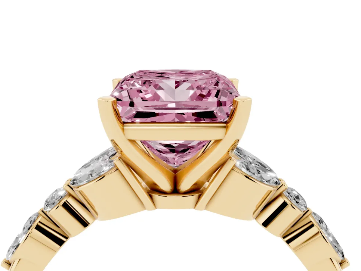 Fancy Pink Princess Cut Diamond Solitaire Ring with Side Stones and Four-Prong Setting Yellow gold