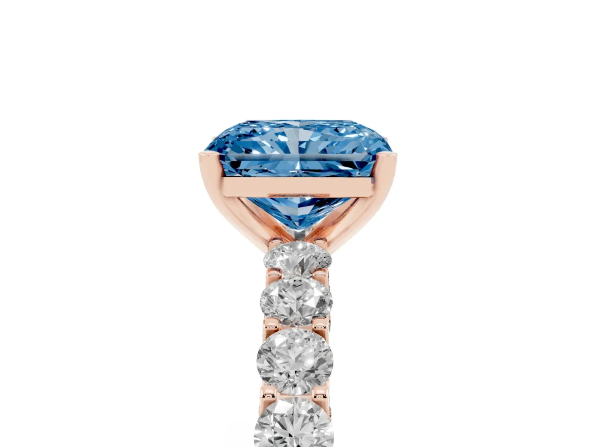 Fancy Blue Radiant Cut Diamond Solitaire Ring with Shared Prong Pavé Band and Four-Prong Setting Rose gold