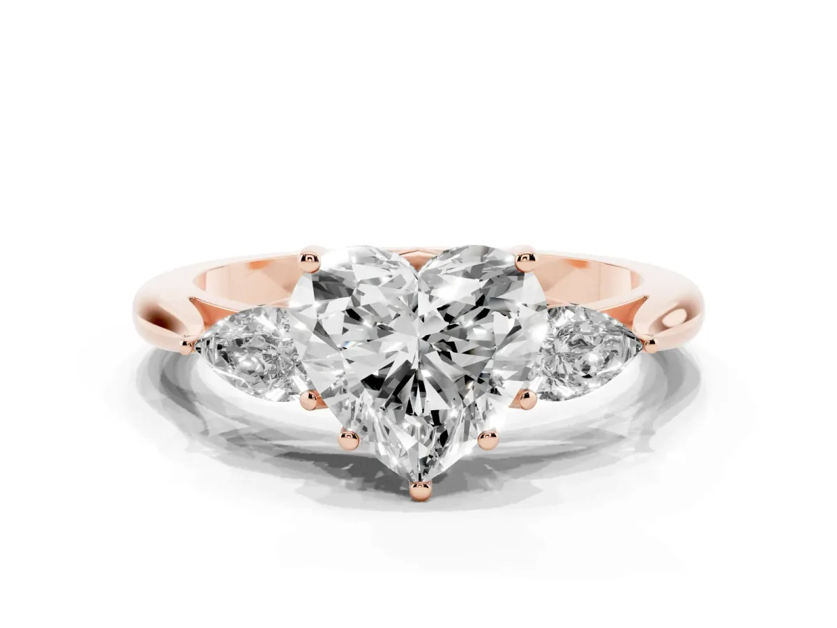 Heart Cut Diamond Three-Stone Ring with Pear Side Stones and Prong Setting Rose gold