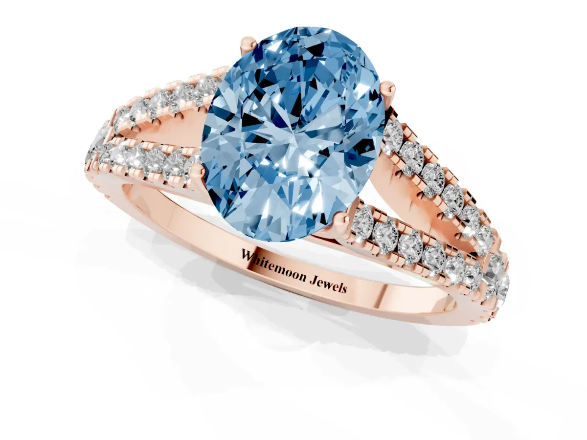 Fancy Blue Oval Cut Diamond Split Shank Pavé Engagement Ring with Four-Prong Setting Rose gold