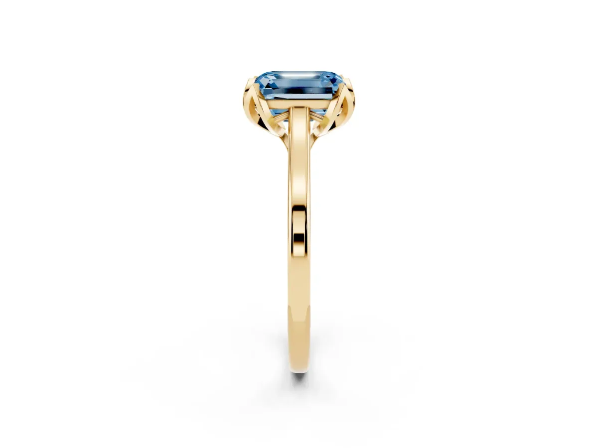 Fancy Blue Emerald Cut Diamond Solitaire Ring with Flower Prong Setting and Classic Band Yellow gold